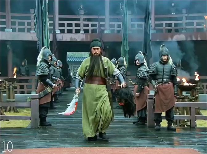 三国演义关羽温酒斩华雄是第几集