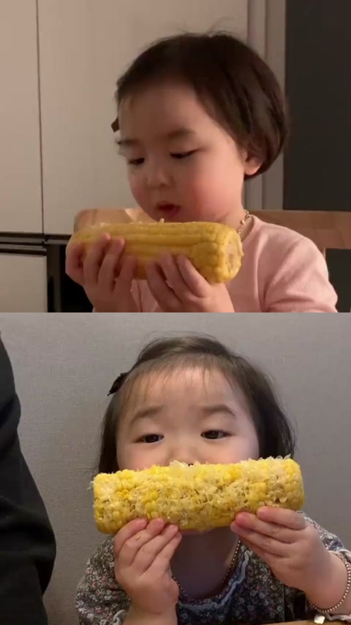 小女孩啃玉米表情包